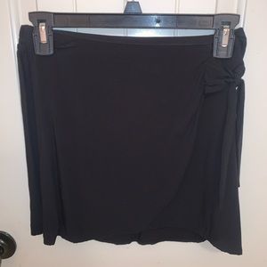 black cross over skirt